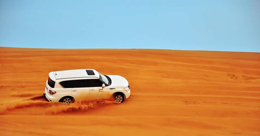 Desert Safari - Private 4WD car - Sandboarding, quad biking, and the sunset stop