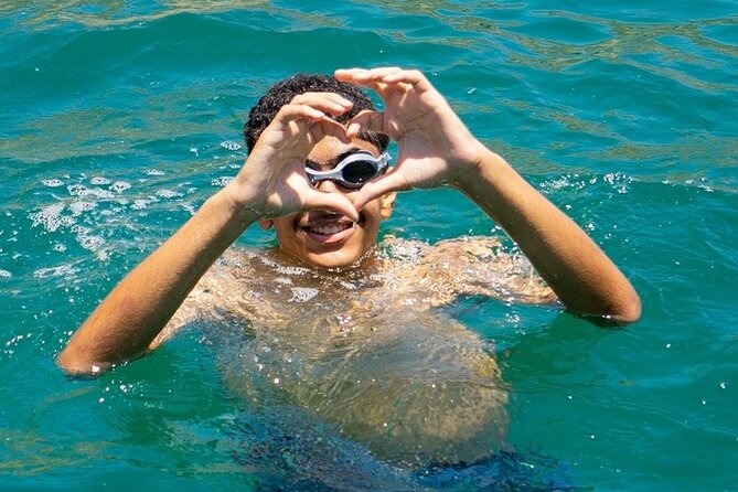 Dolphin Watching and Snorkeling Cruise Experience in Muscat - Refreshments before the snorkeling stop