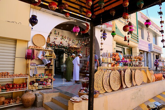 Enjoy the beauty of Fanja, Samail، Izki & Nizwa on a special trip - Izki: mud houses, mountain rock, and date palms