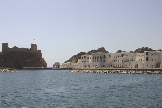 Evening Sunset Dhow Cruise Tour - Muscat - The Corniche and Muscat’s coast from offshore