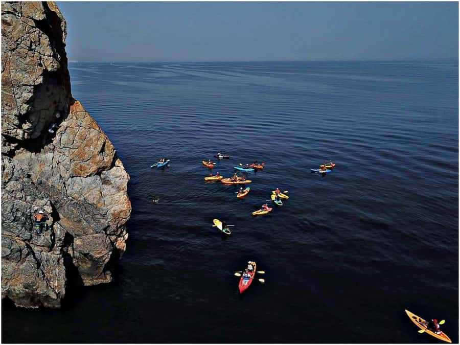 From Muscat: Al Qurum Beach Sunset Kayaking Experience - Paddling calm waters along the coast