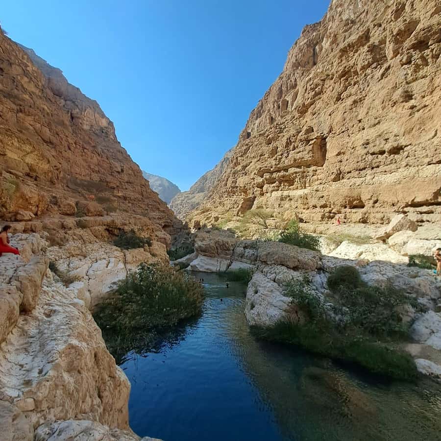 From Muscat: Wadi Shab Expedition - Crossing the wadi on foot