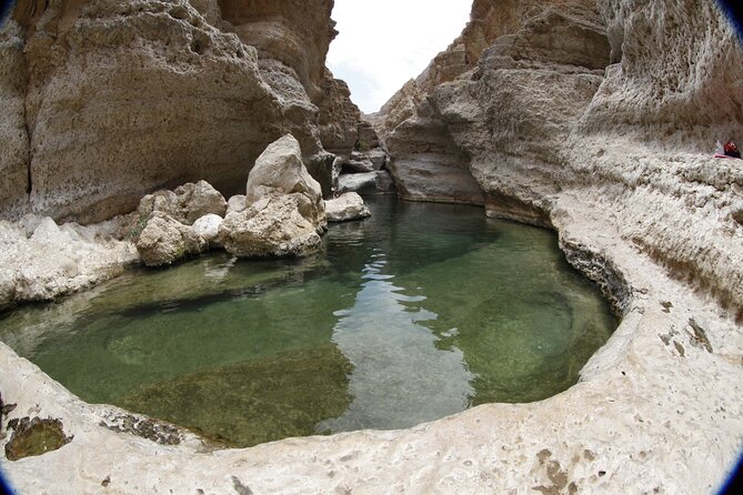 Full-day Private Guided Wadi Shab Tour in Oman - Bimmah Sinkhole brings a different kind of water stop