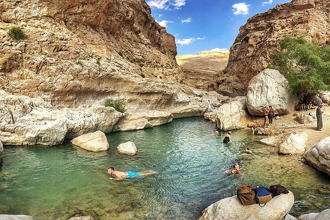 Full-Day Wahiba Desert and Wadi Bani Khalid Group Tour - Wadi Bani Khalid: cool water in a dry country