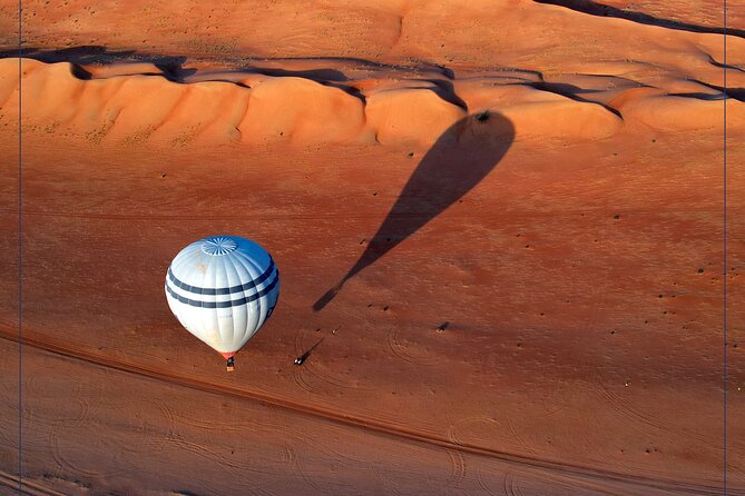 Hot Air Balloon Tour at Wahiba Sands - Landing, refreshments, and the commemorative medal