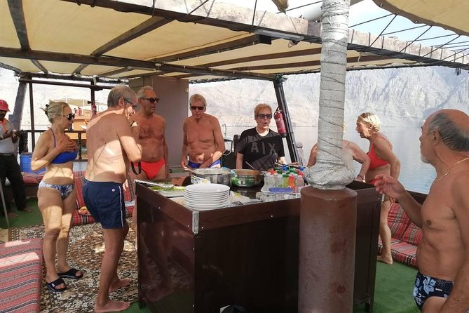 Khasab Dhow Cruise Full day, Buffet Lunch on Board, swimming - Seebi, Telegraph Island, and the fishing villages