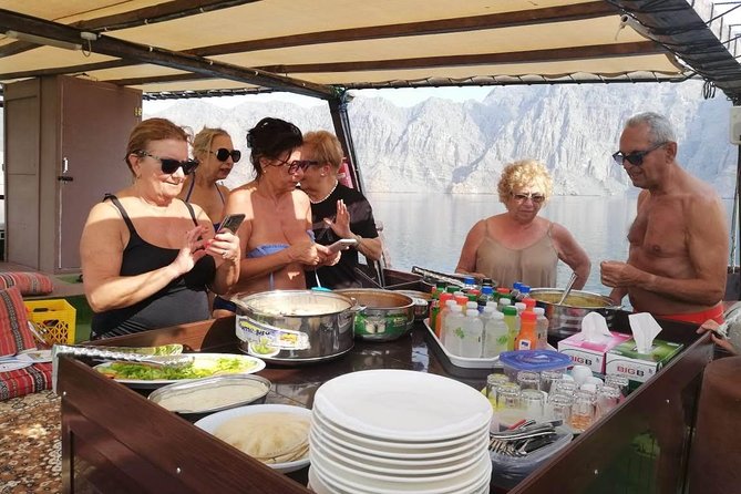 Khasab Dhow Cruise Full day, Buffet Lunch on Board, swimming - Swimming and snorkeling at two stops