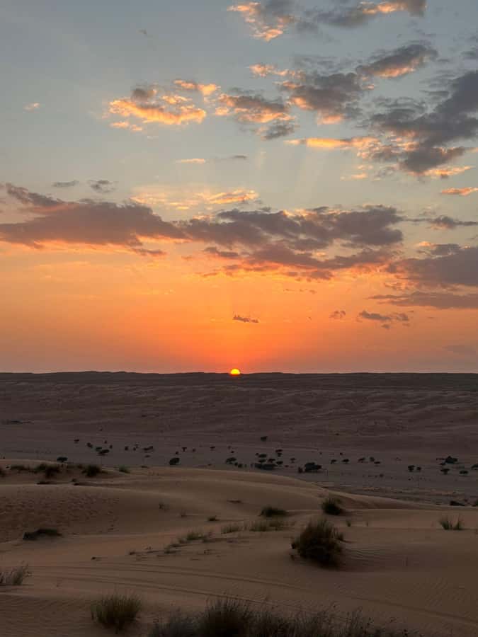 Muscat: Desert Sunset &Wadi Bnai Khalid Full-Day Tour+Lunch - Camels and a traditional Bedouin house