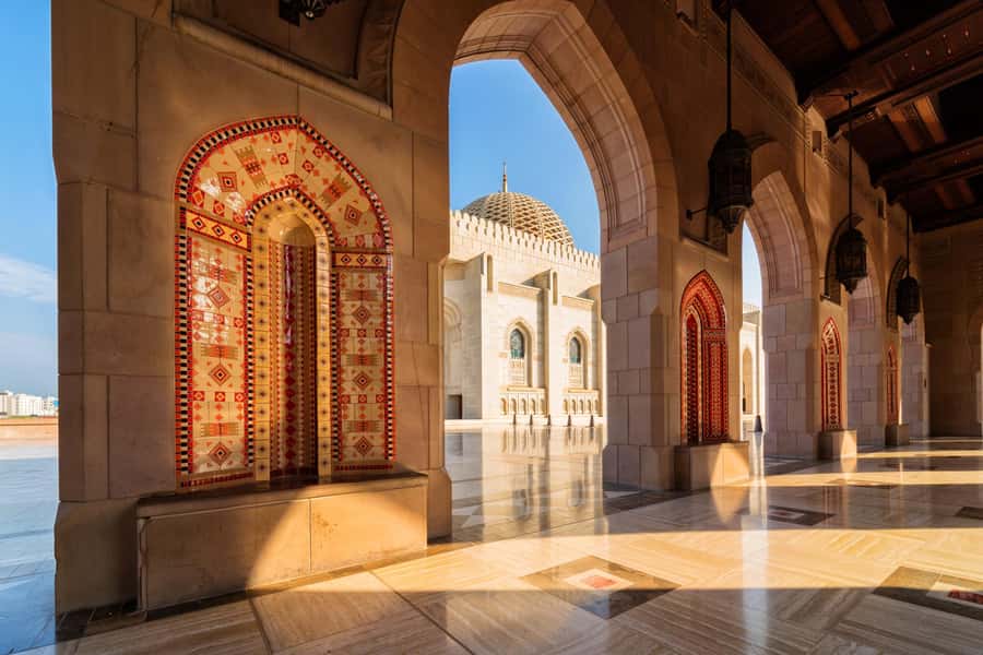 Muscat: Half-Day Sightseeing Essentials Tour and Audio Guide - Muscat’s ministries district on the road