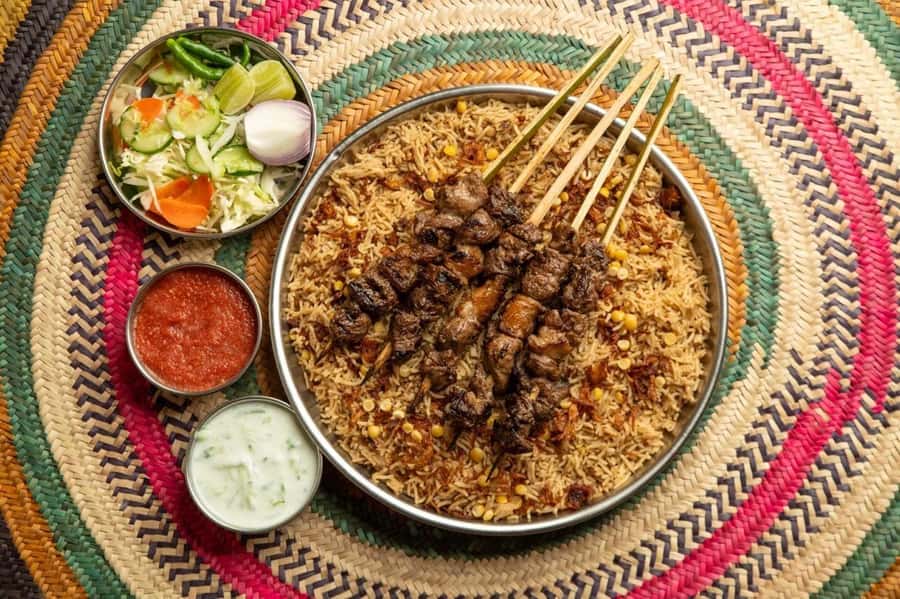 Muscat: Omani Food Tour with Shuwa & Halwa - Omani bread with sweet and savory toppings