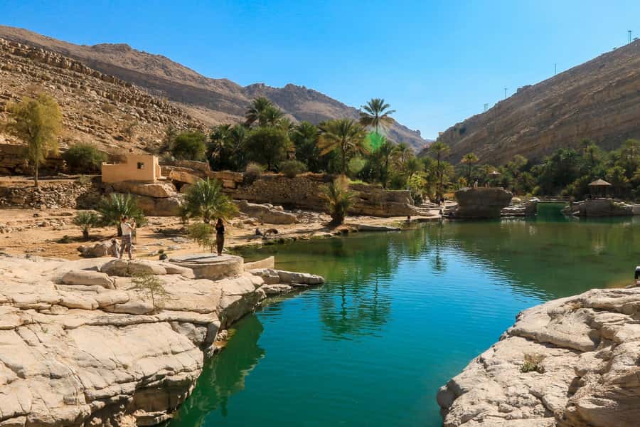 Muscat: Southern Treasures & Wadi Shab Tour with Audio Guide - Swimming through Wadi Shab’s clear pools