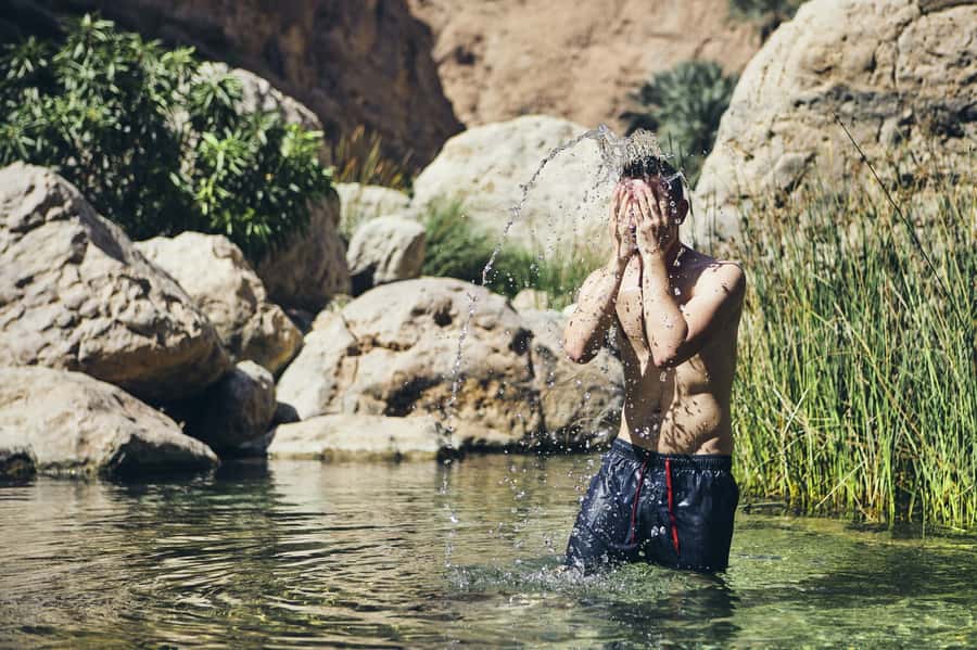 Muscat: Wadi Shab and Bimmah Sinkhole Full-Day Tour - Reaching the pools and cave waterfall