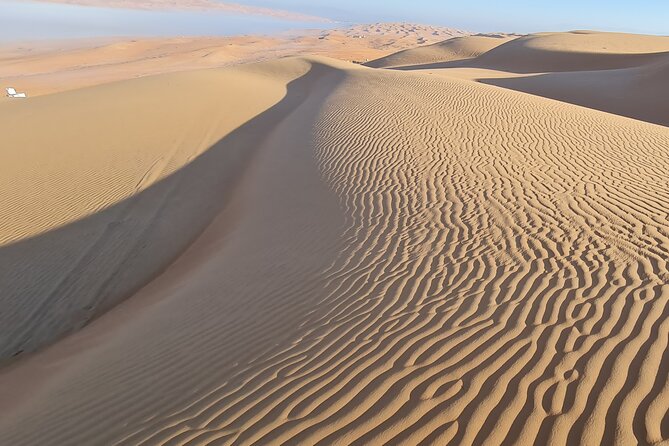 Oman Highlights: Wahiba Sands Desert & Wadi Bani Khalid Tour - Timing, sunset, and the eight-hour schedule