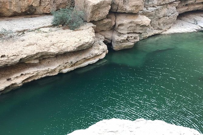 Private Day Trip to Wadi Shab, Fins Beach & Bimmah Sinkhole - Bimmah Sinkhole’s turquoise water