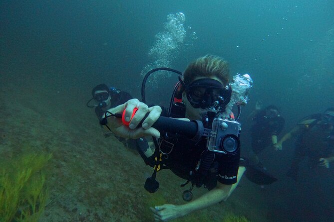 Scuba Diving Adventure in Musandam, Oman - Getting aboard at Daba Port