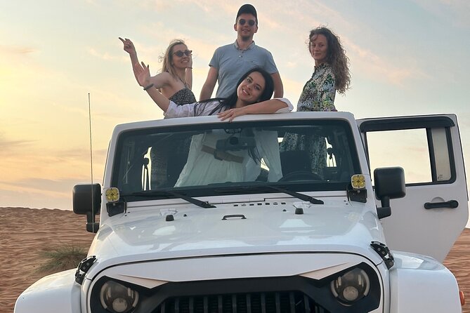 Sunset in Wahiba Sands 4x4 Adventure - Omani Dinner Beneath the Stars