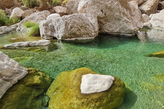 Wadi Al Arbeieen Sinkhole & Fins Beach Swim & Hike - Bimmah Sinkhole: a short geological stop