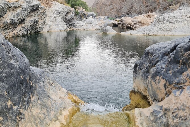 Wadi Al Arbeieen Sinkhole & Fins Beach Swim & Hike - Fins Beach and its white sands