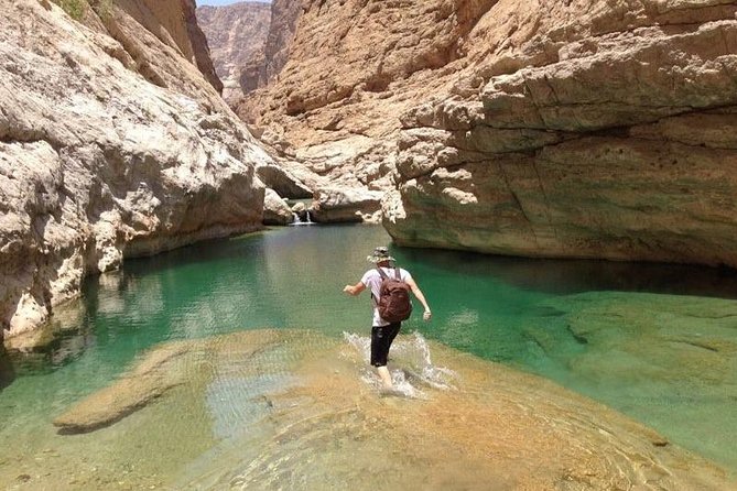 Wadi Arbeieen Tour - The main pool, waterfall, and cliff jumps