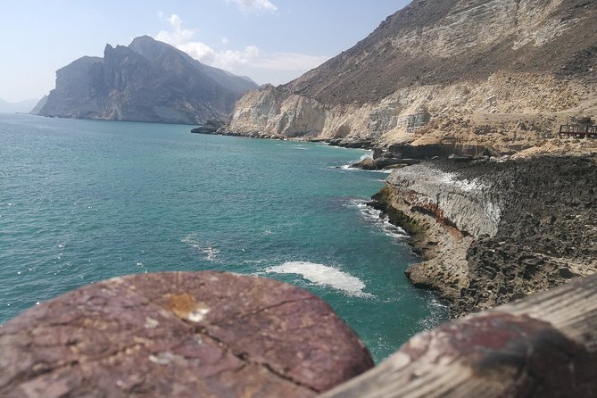 Where Sea Meets Rock: A Scenic Journey to West Salalah’s Shores - Mughsail Beach brings you down to the surf